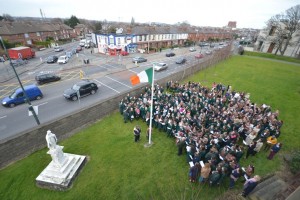 Image of school at flag raising ceremony.