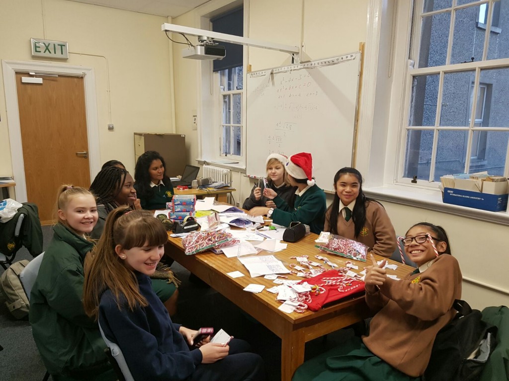 Student Council making Candy Cane treats.