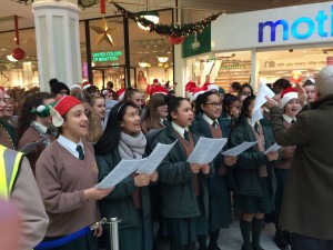 The school choir carol singing for charity in St, Stephen's Green Shopping Centre.