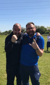 Mr. Wall and Mr. Howard celebrate the team's success.