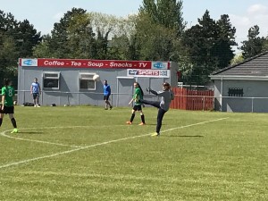 A defensive clearance from Goalkeeper Ruth Ecumore