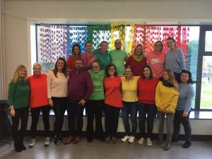 Some of our teachers dressed in the colours of the rainbow flag.
