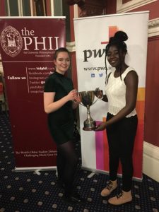 Ruth and Ciara with the Philspeaks trophy in Trinity College