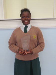 Ekenenna Chukwuewuzie with her trophy.