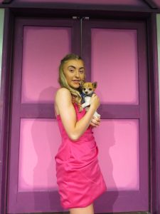 Emily O'Neill as Elle Woods (with Coco as Bruiser Woods)