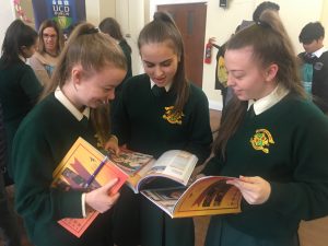 Three 6th year students discuss their college options at our college fair.