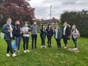 Bridge 21 students enjoying their ice creams with Warren Farrell.